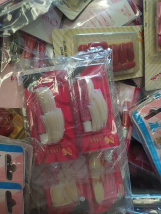 400 paq. uñas surtidas 