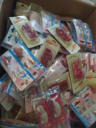 400 paq. uñas surtidas 