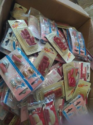 400 paq. uñas surtidas 