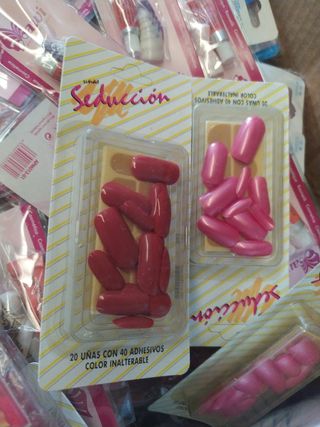 400 paq. uñas surtidas 