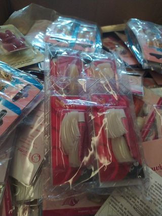 400 paq. uñas surtidas 