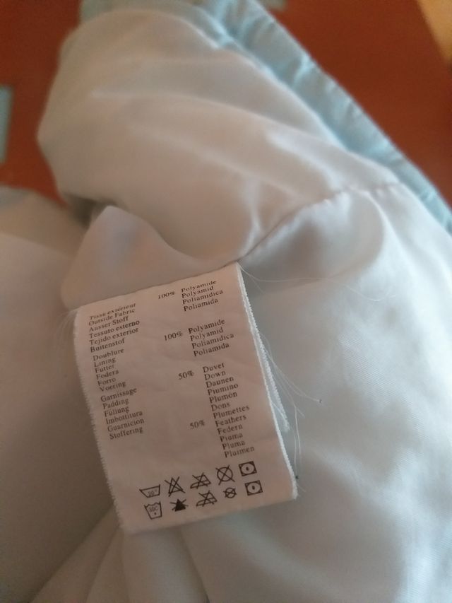 Plumas mujer. Azul claro.