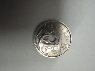 moneda de 50 centimos de agujero desplazado 