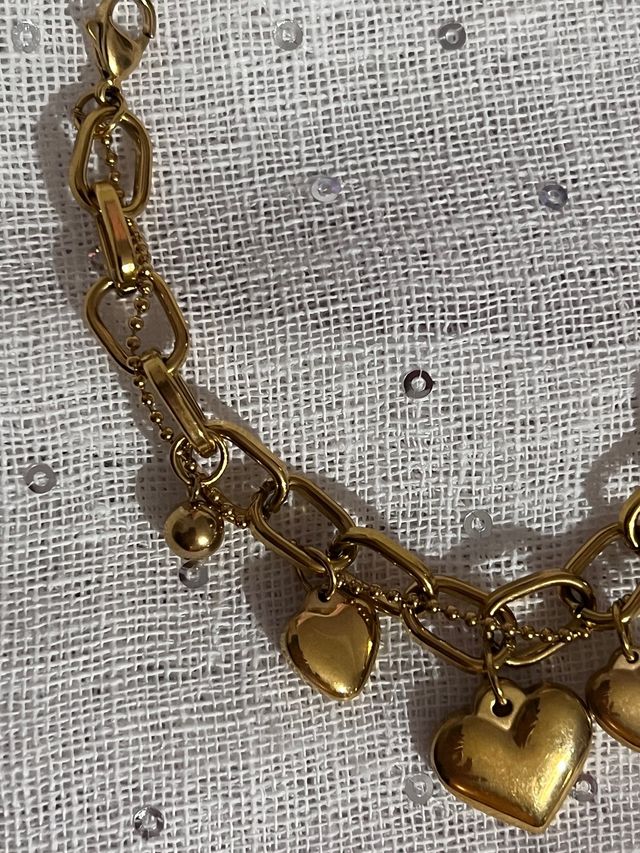 Bracciale catena con cuori pendenti dorati