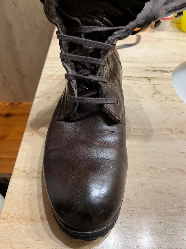 Botas altas de piel revestidlas de lana