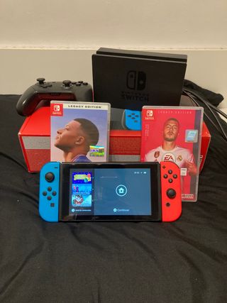 Nintendo  + 2 juegos + mando + protector + funda