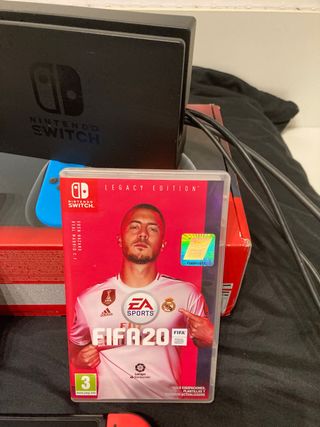 Nintendo  + 2 juegos + mando + protector + funda