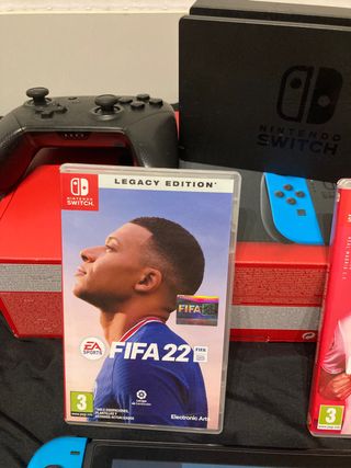 Nintendo  + 2 juegos + mando + protector + funda