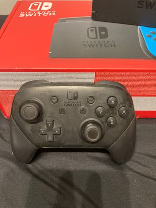Nintendo  + 2 juegos + mando + protector + funda