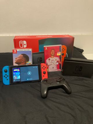 Nintendo  + 2 juegos + mando + protector + funda