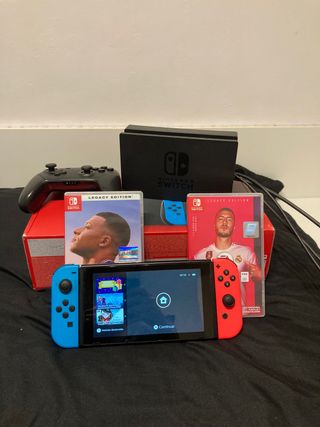Nintendo  + 2 juegos + mando + protector + funda