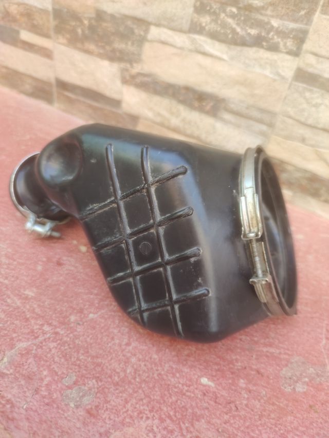 Goma de carburador a caja de filtro.