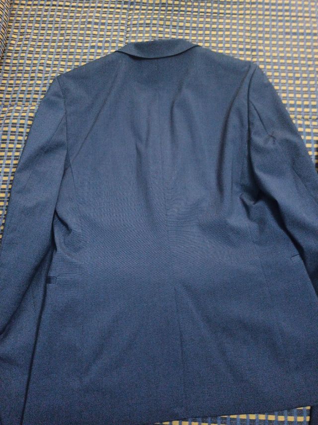traje chaqueta y pantalón azul hombre