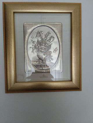 Quadro  in argento e cornice in legno.