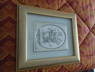 Quadro  in argento e cornice in legno.