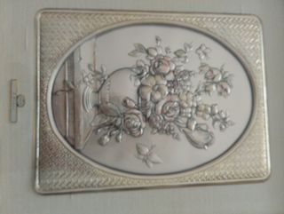 Quadro  in argento e cornice in legno.