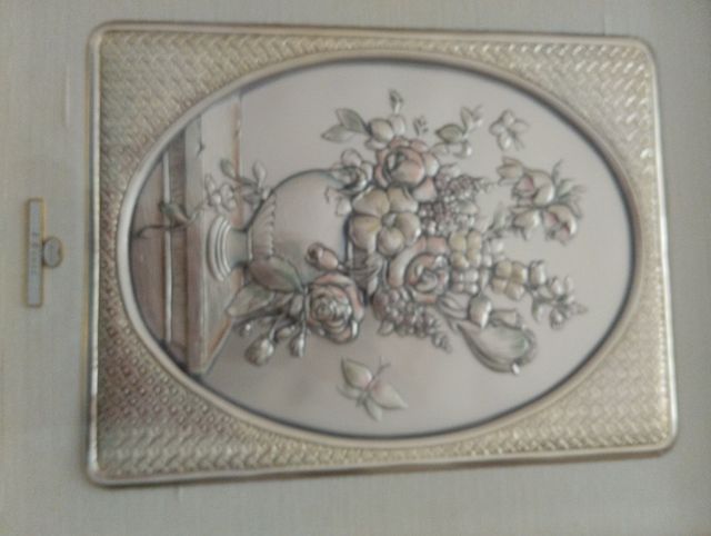 Quadro  in argento e cornice in legno.