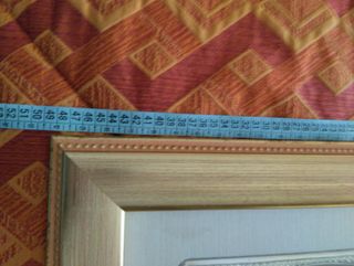 Quadro  in argento e cornice in legno.