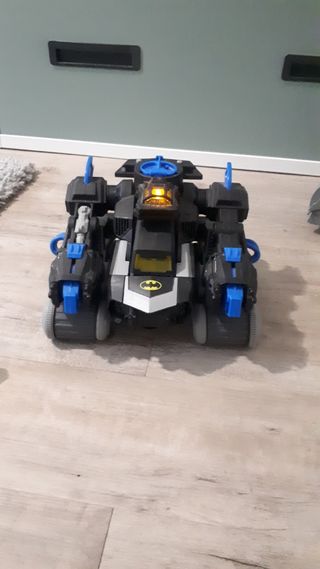 robot batman fisher price dc, con muñeco y discos