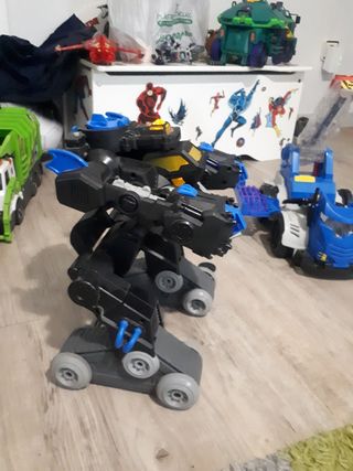 robot batman fisher price dc, con muñeco y discos