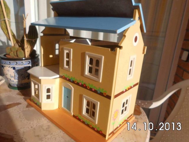 casa infantil de madera de un 1 metro de alto X 85