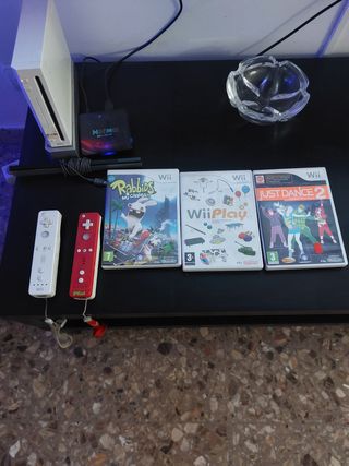 Nintendo wii con 1 mando y 3 juegos