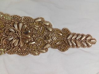 Cintura de strass flecos color oro viejo