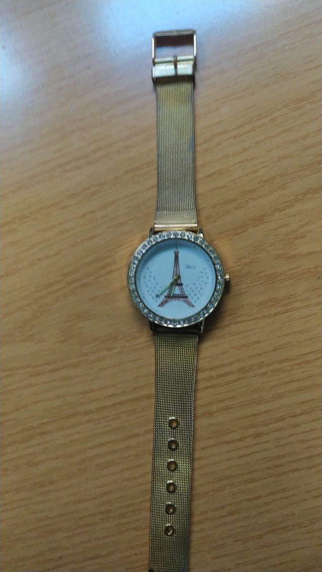 reloj de pulsera,con dibujo en esfera