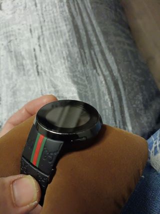 reloj Gucci cuarzo suizo..swiss made 