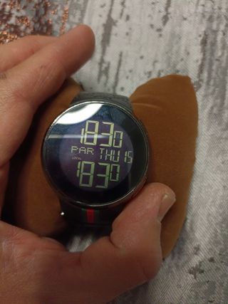 reloj Gucci cuarzo suizo..swiss made 