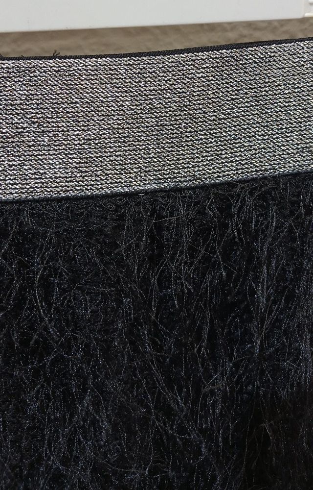 Minifalda flecos negra