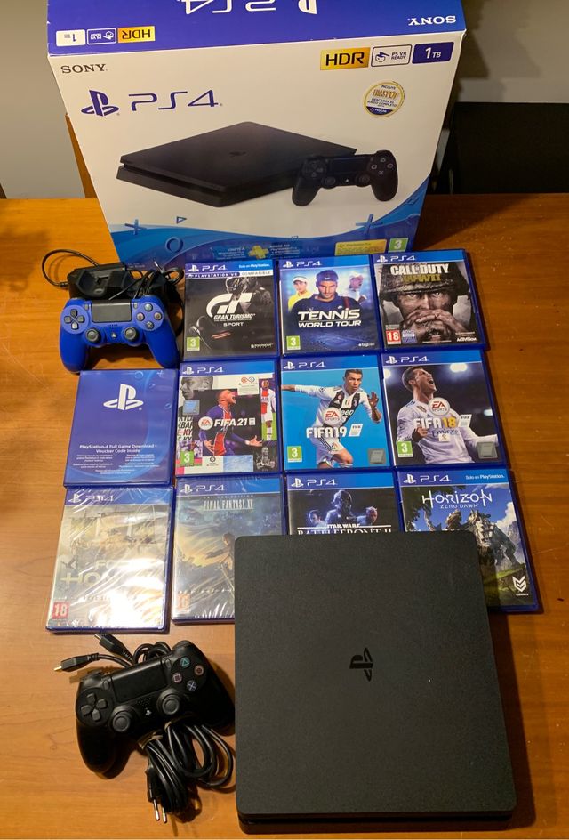 PS4 DE 1 TB + MANDO EXTRA+ CARGADOR DOBLE+ 10 JUEG