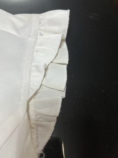 Blusa blanca cuello Mao sin mangas