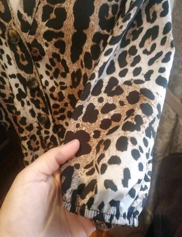 Estiloso blusa animal print