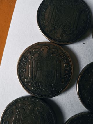 12 monedas de 2.5 pesetas de 1953 estrella 54.    