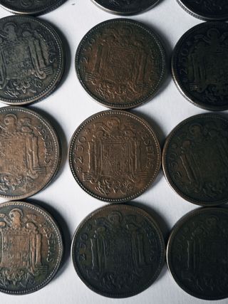12 monedas de 2.5 pesetas de 1953 estrella 54.    