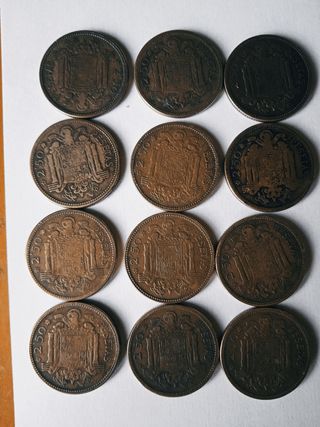 12 monedas de 2.5 pesetas de 1953 estrella 54.    