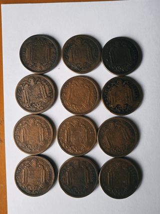 12 monedas de 2.5 pesetas de 1953 estrella 54.    