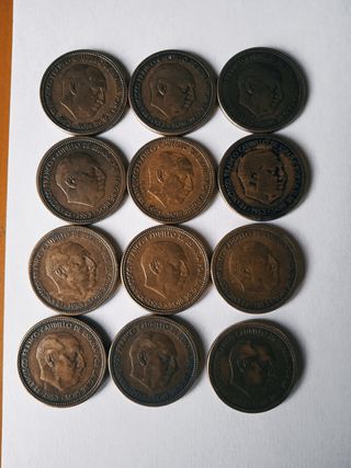 12 monedas de 2.5 pesetas de 1953 estrella 54.    