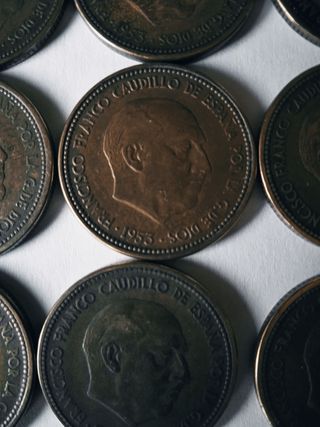 12 monedas de 2.5 pesetas de 1953 estrella 54.    