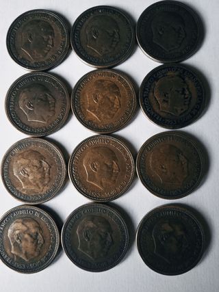 12 monedas de 2.5 pesetas de 1953 estrella 54.    