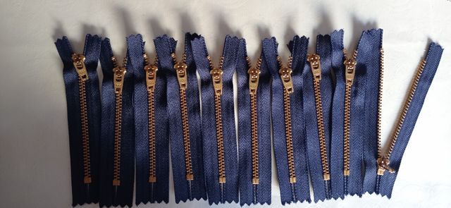 Cremalleras azul marino dorado Ultimas