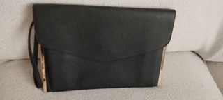 Cartera de mano . negra