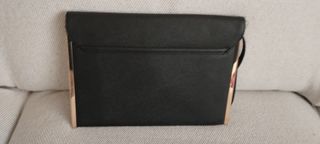Cartera de mano . negra