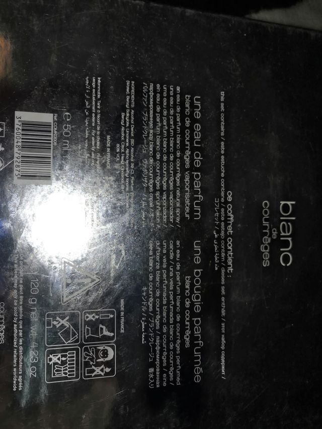 Perfume Blanc de Courrèges y vela ambiente