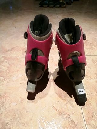patines rosa y negros talla 34 35 y 36