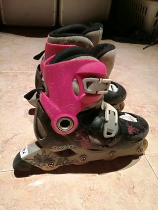 patines rosa y negros talla 34 35 y 36
