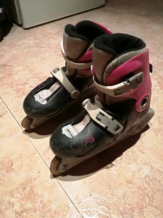 patines rosa y negros talla 34 35 y 36