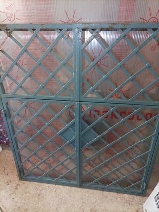 reja ventana con llave