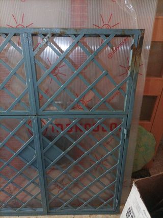 reja ventana con llave
